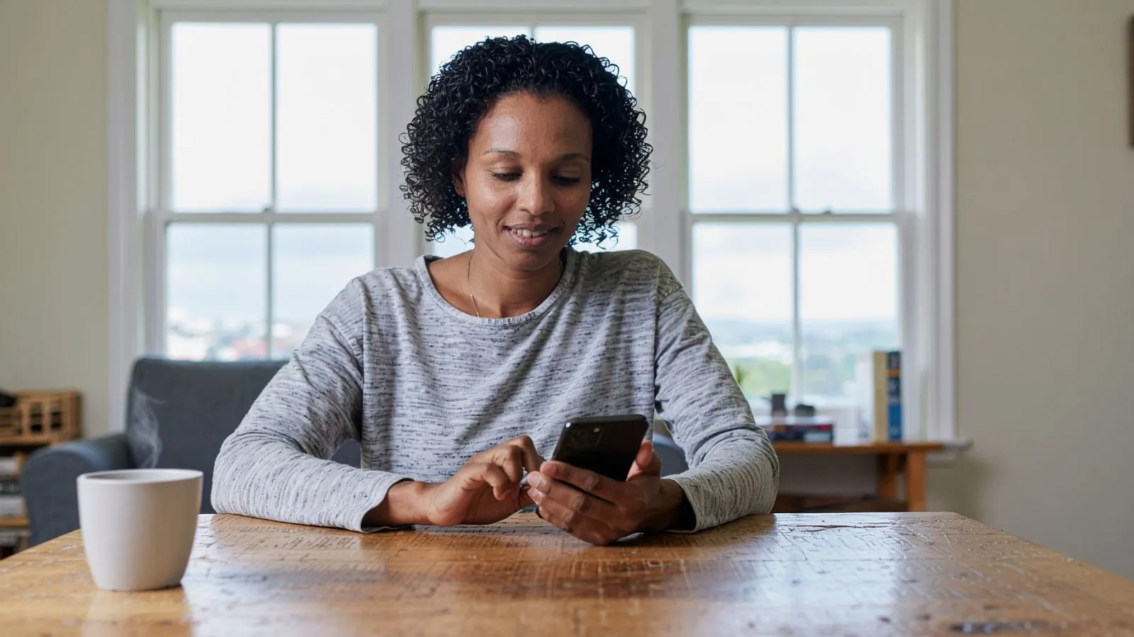 South African home buyer calmly reading what interest rate changes really mean for home buyers